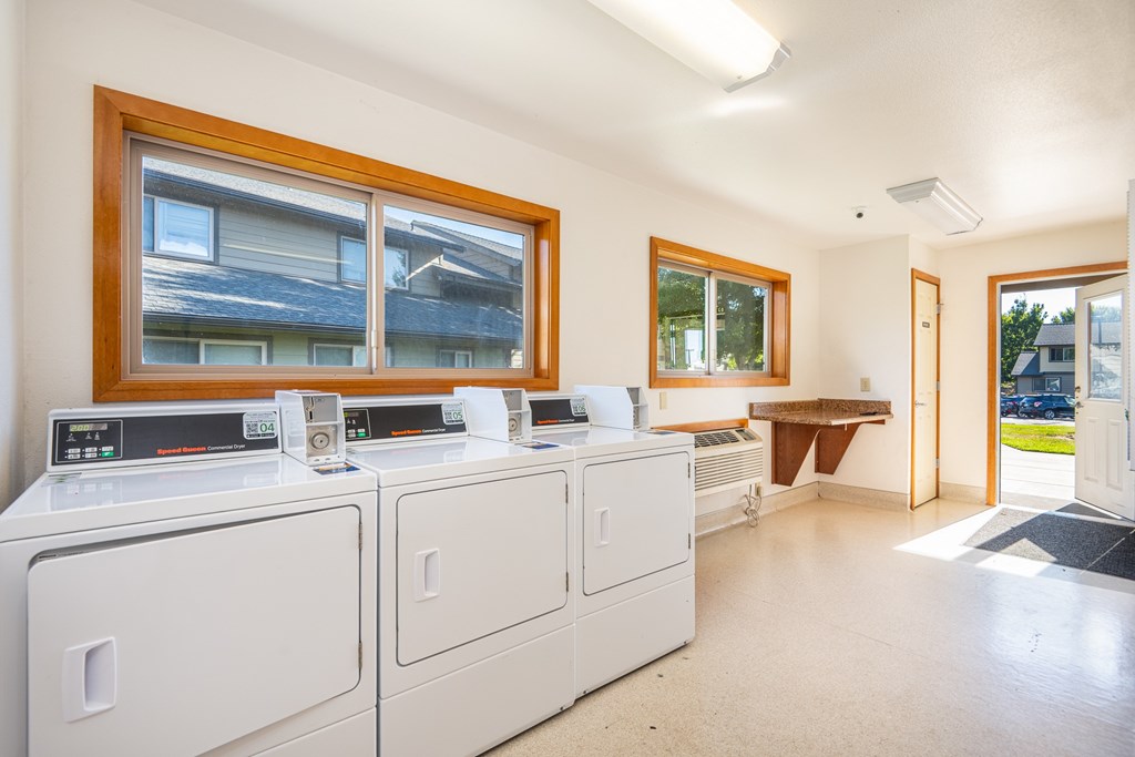 A laundry room with a washer and dryer.