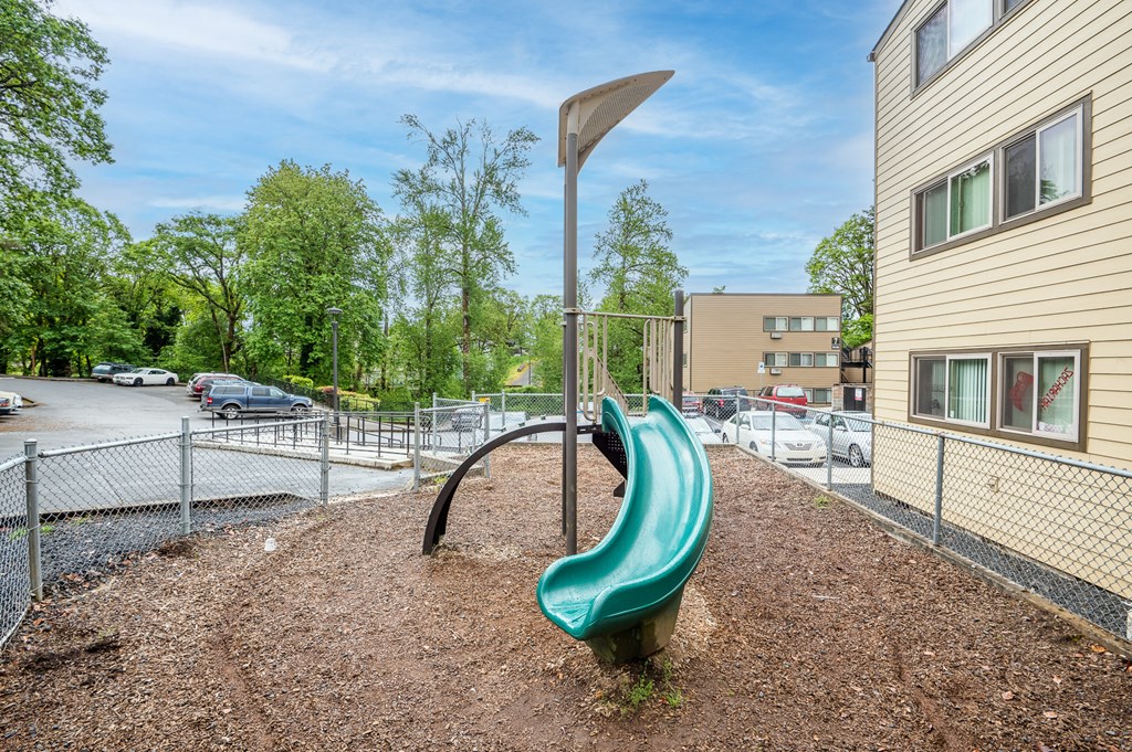 the preserve at ballantyne commons playground with a slide