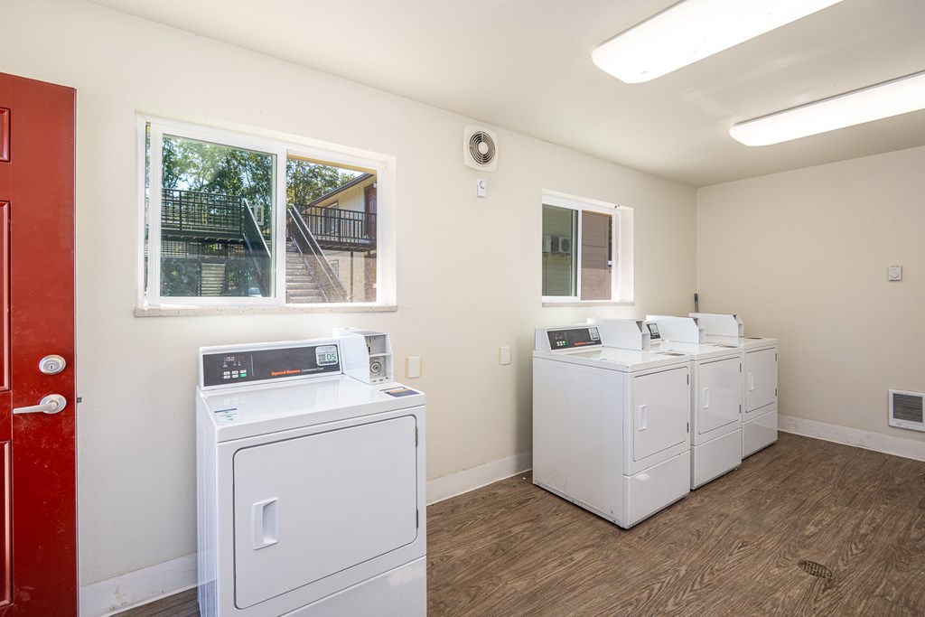 A laundry room with a washer and dryer.