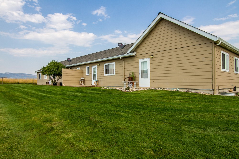 a house with a lawn in front of it