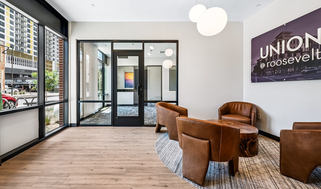 A room with brown chairs and a sign that says "UNION".