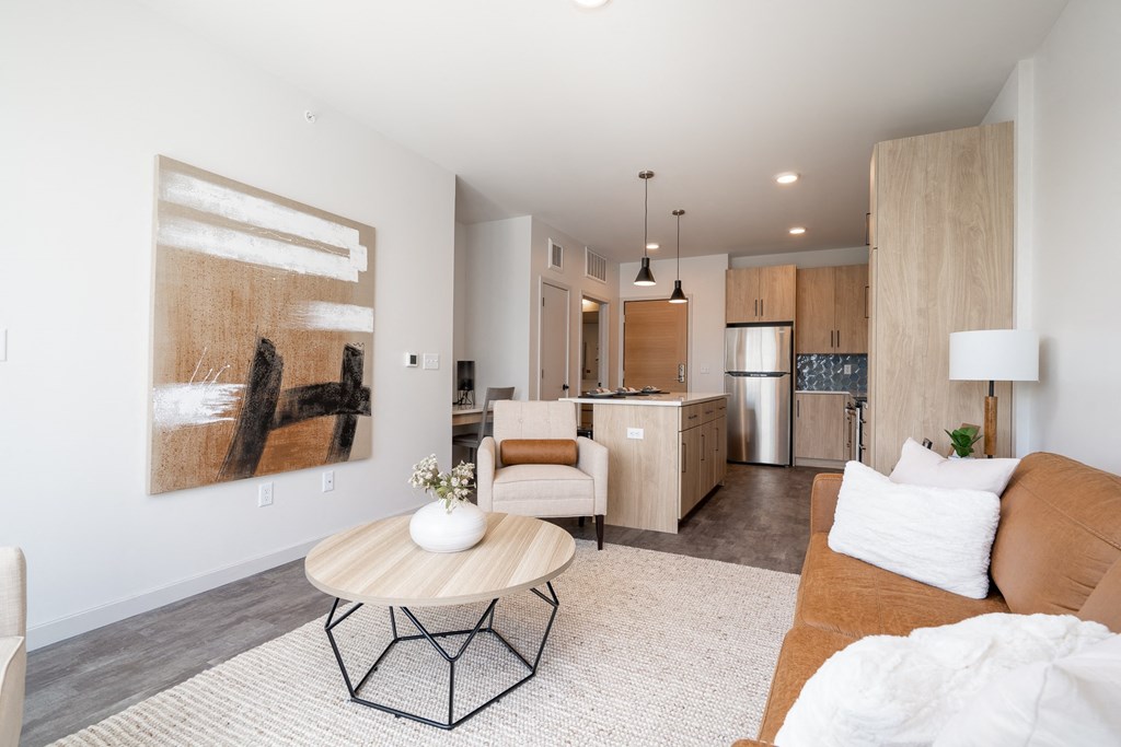 a living room with a couch and a table