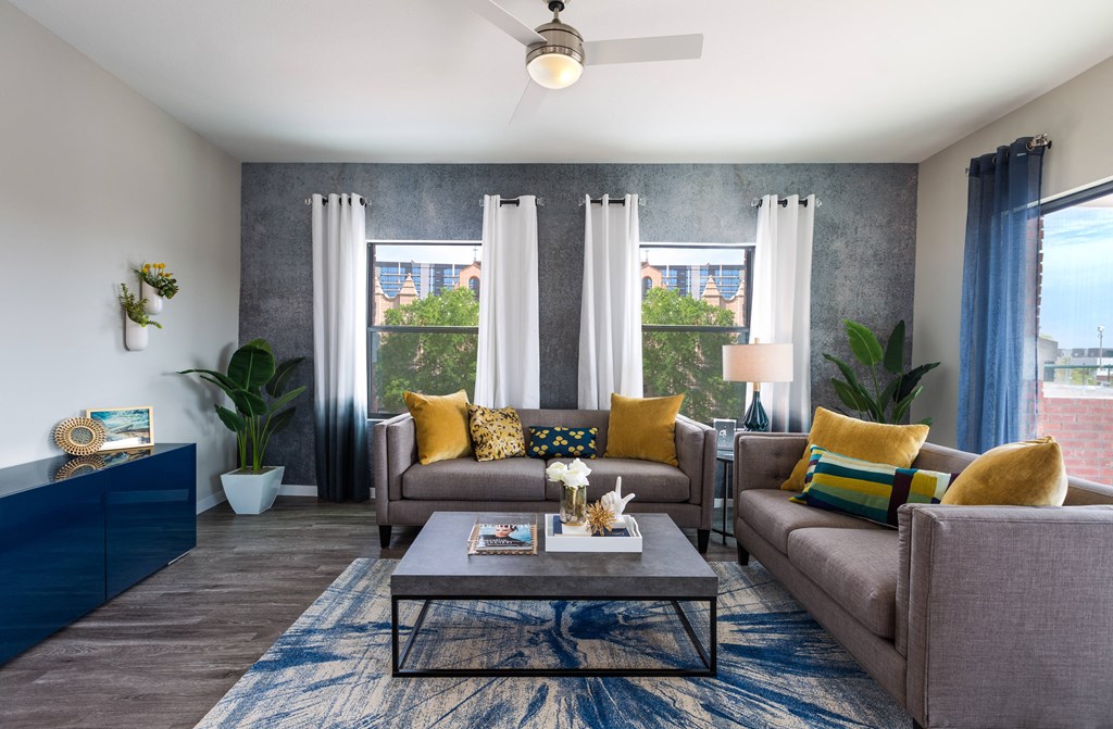 Ample Natural Lighting And Large Windows In Living Rooms At Union at Roosevelt Apartments In Phoenix, AZ