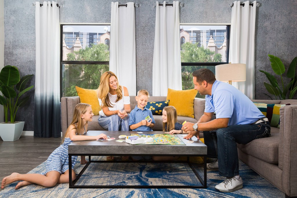 People Sitting On Couch At Union @ Roosevelt Apartments In Phoenix, AZ