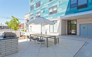 Outdoor Table At Chroma Apartments In Minneapolis, MN - Photo Gallery 4