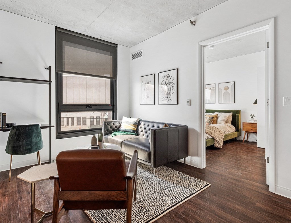 a living room with a couch and a chair