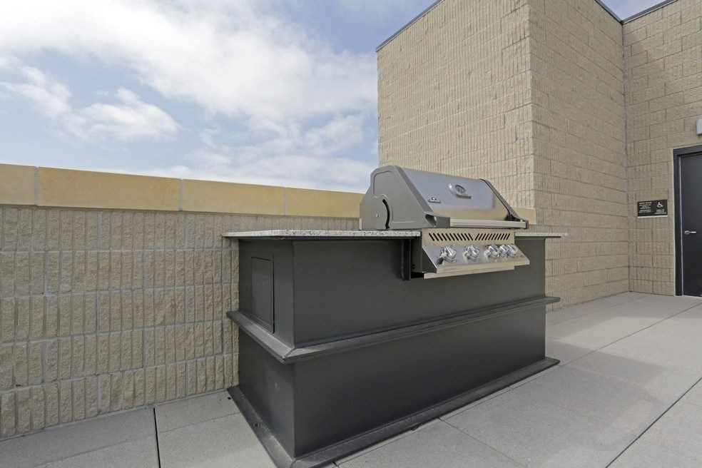 a parking meter on the side of a building