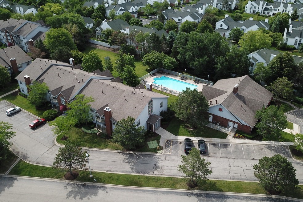 a aerial view of a house with a swimming pool