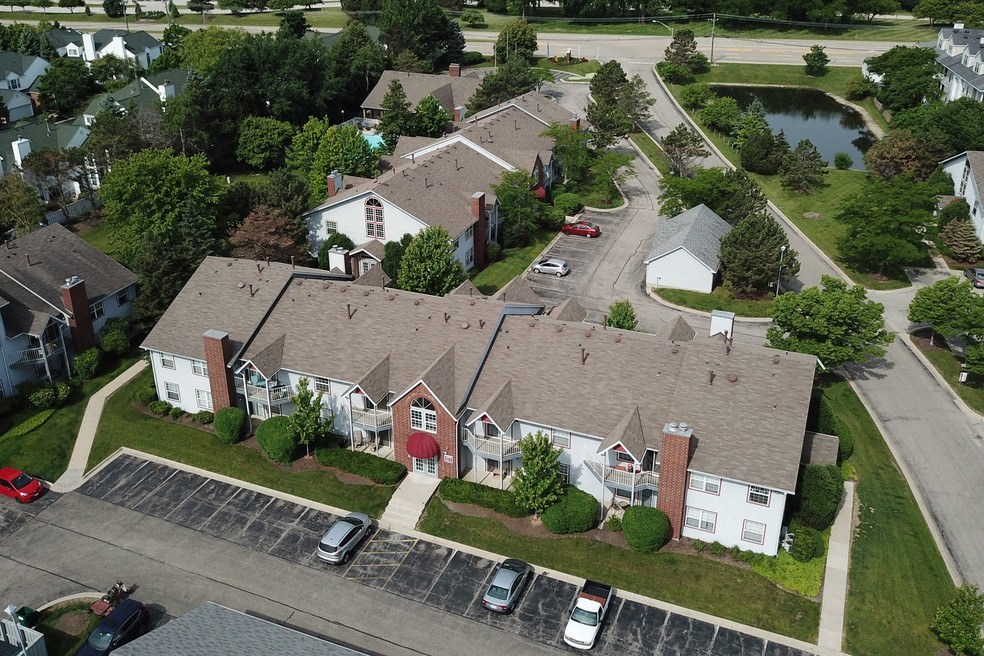 an aerial view of a neighborhood of houses