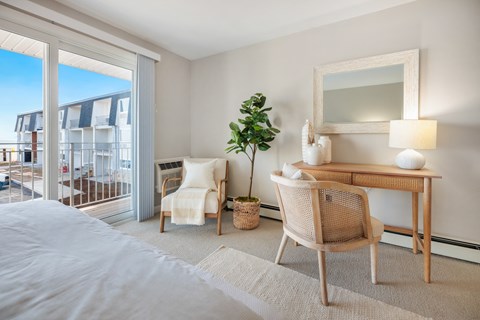 Bedroom with a bed and a dresser at 151 Ocean Road LLC, Narragansett, RI, Rhode , 02882