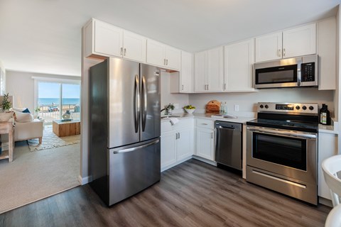 Modern Kitchen With Stainless Steel Appliances And Double Door Refrigerators at 151 Ocean Road LLC, Narragansett, Rhode