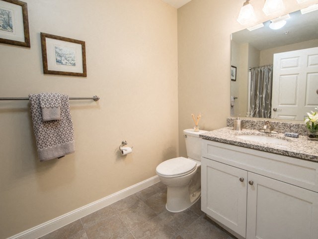 Bathroom with tile flooring