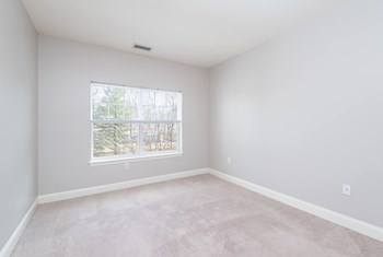 Drum Hill 2 Bedroom Apartment bedroom, with plush carpeting and large windows - Photo Gallery 29