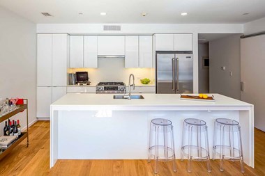 26 West Broadway luxury apartment and penthouses across from red line kitchen and bright finishes