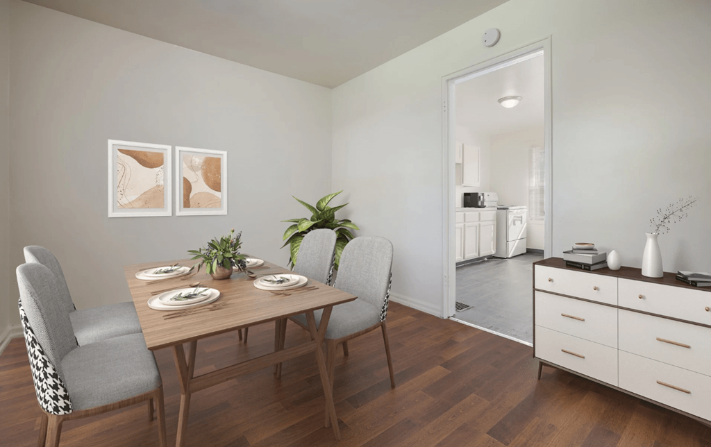 a dining room with a table and chairs