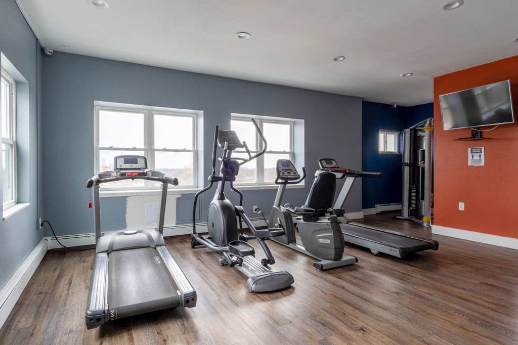 the gym at the district flats apartments in lenexa
