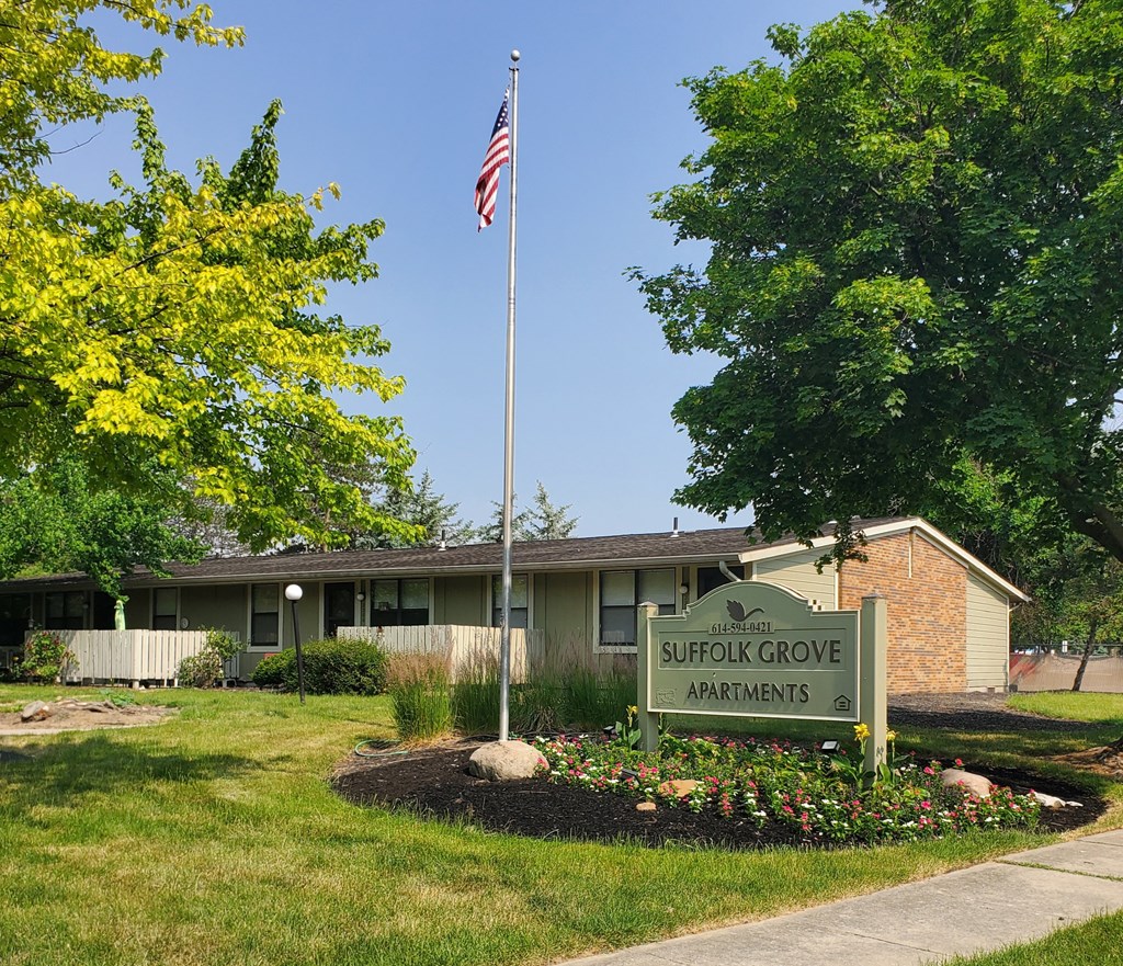 a building with an american flag in front of it
