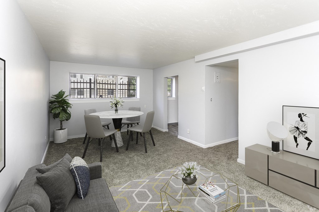 a living and dining area in a 555 waverly unit