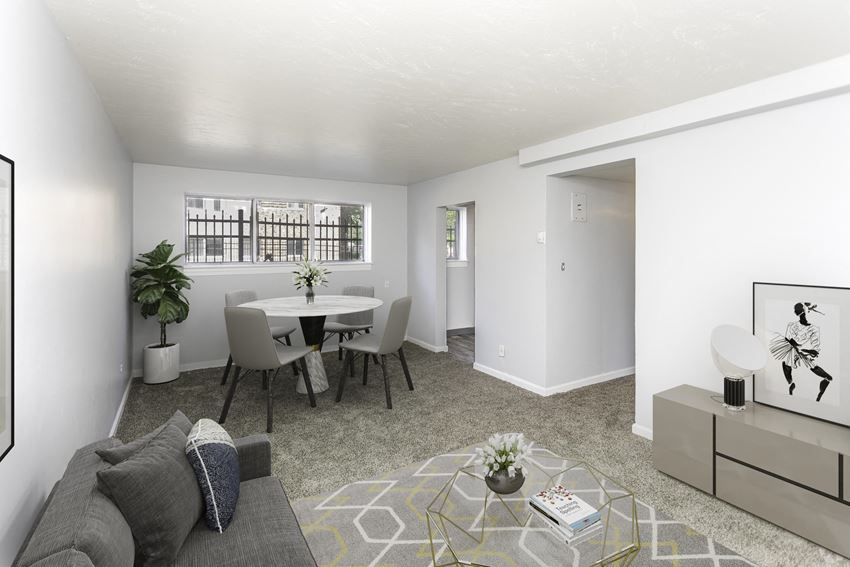 a living and dining area in a 555 waverly unit - Photo Gallery