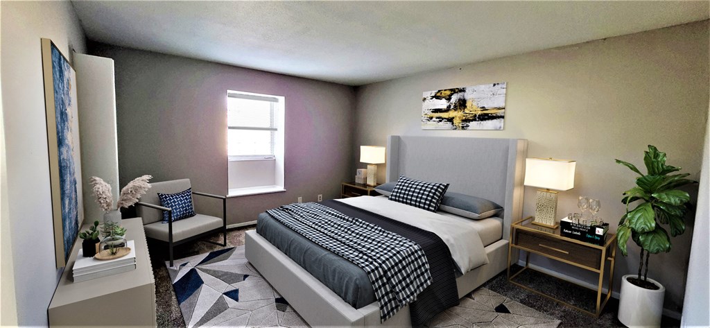 a bedroom with a large bed and a window