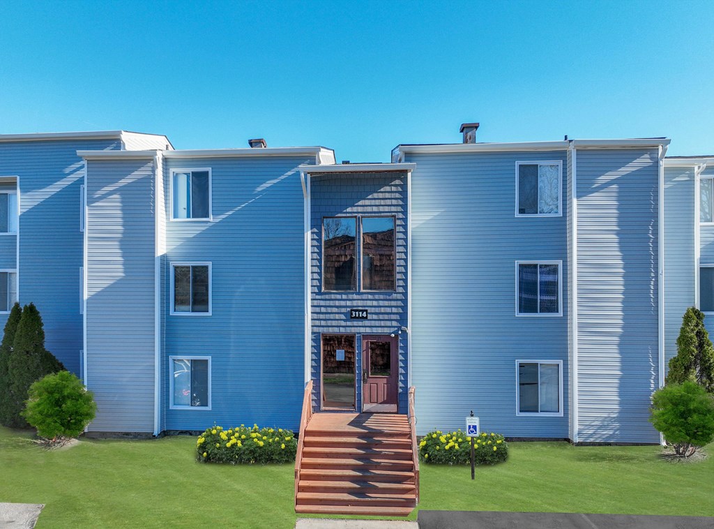 A blue house with a red door and a sign that says "111".