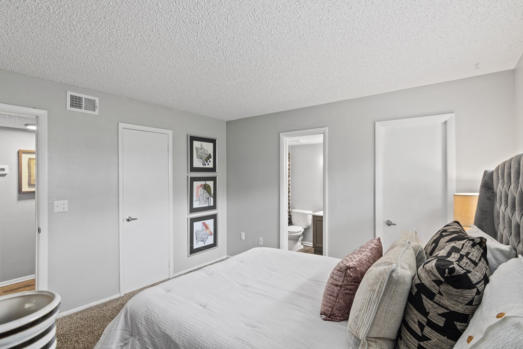 our apartments offer a bedroom with a large bed and a bathroom