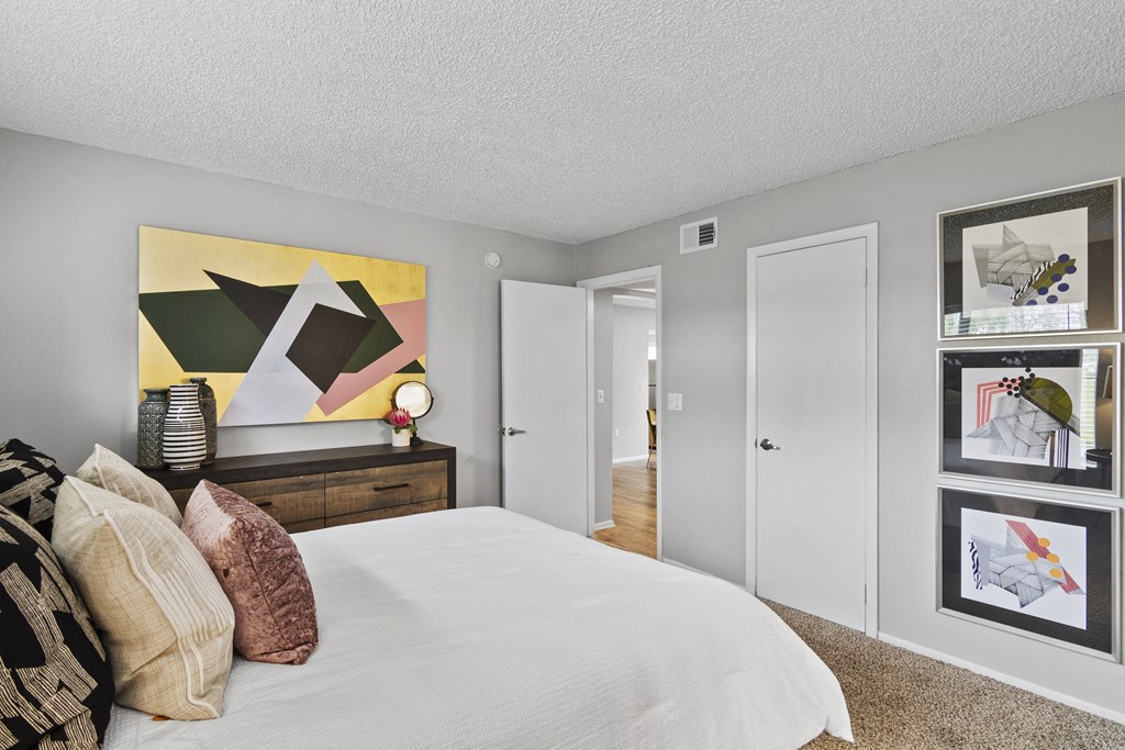 our apartments offer a bedroom with a bed and a closet