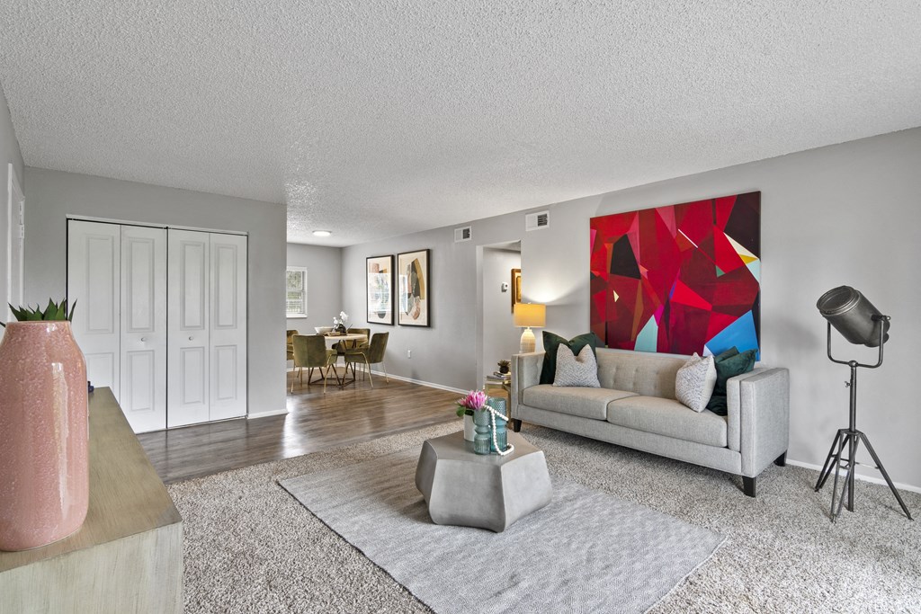 a living room with a couch and a table