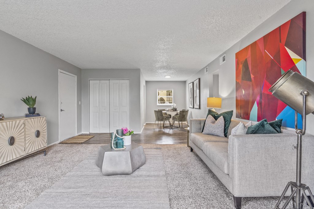 a living room with a couch and a table