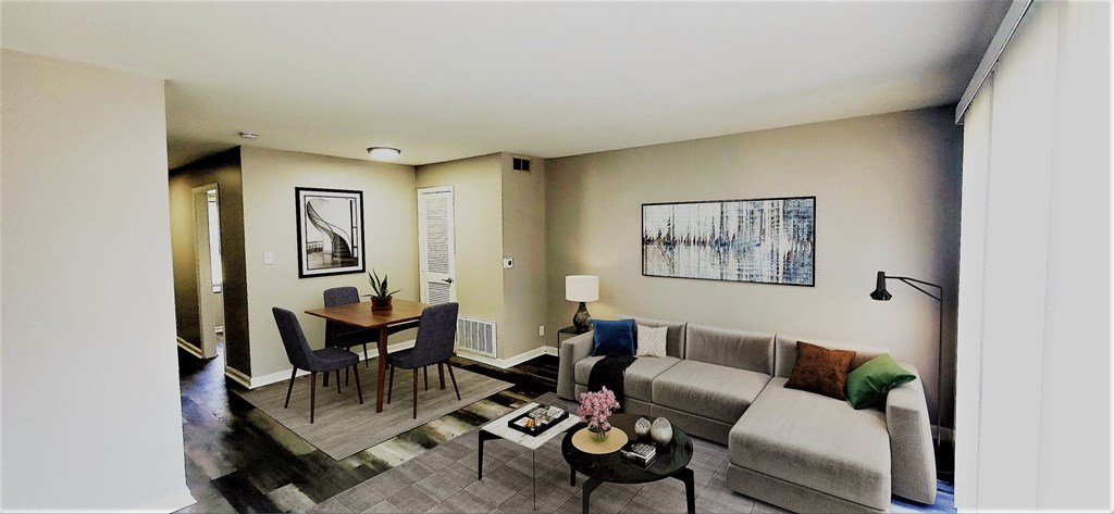 a living room with a couch and a table