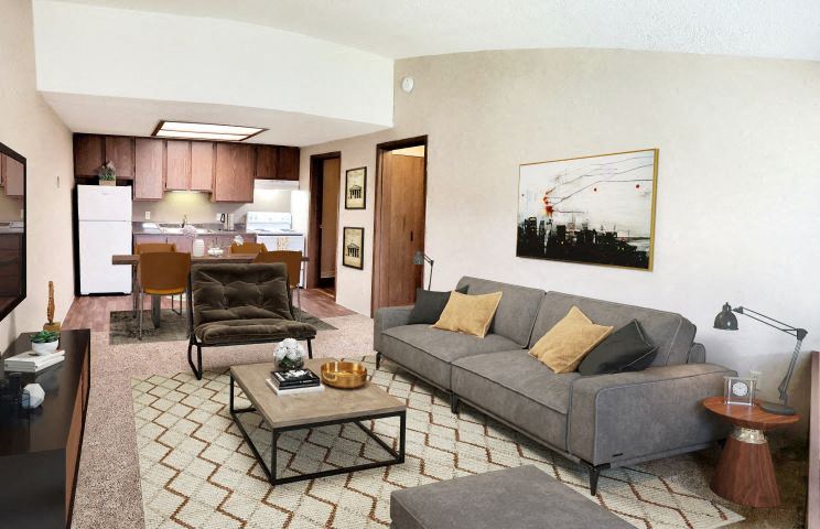 a living room with a couch and a table