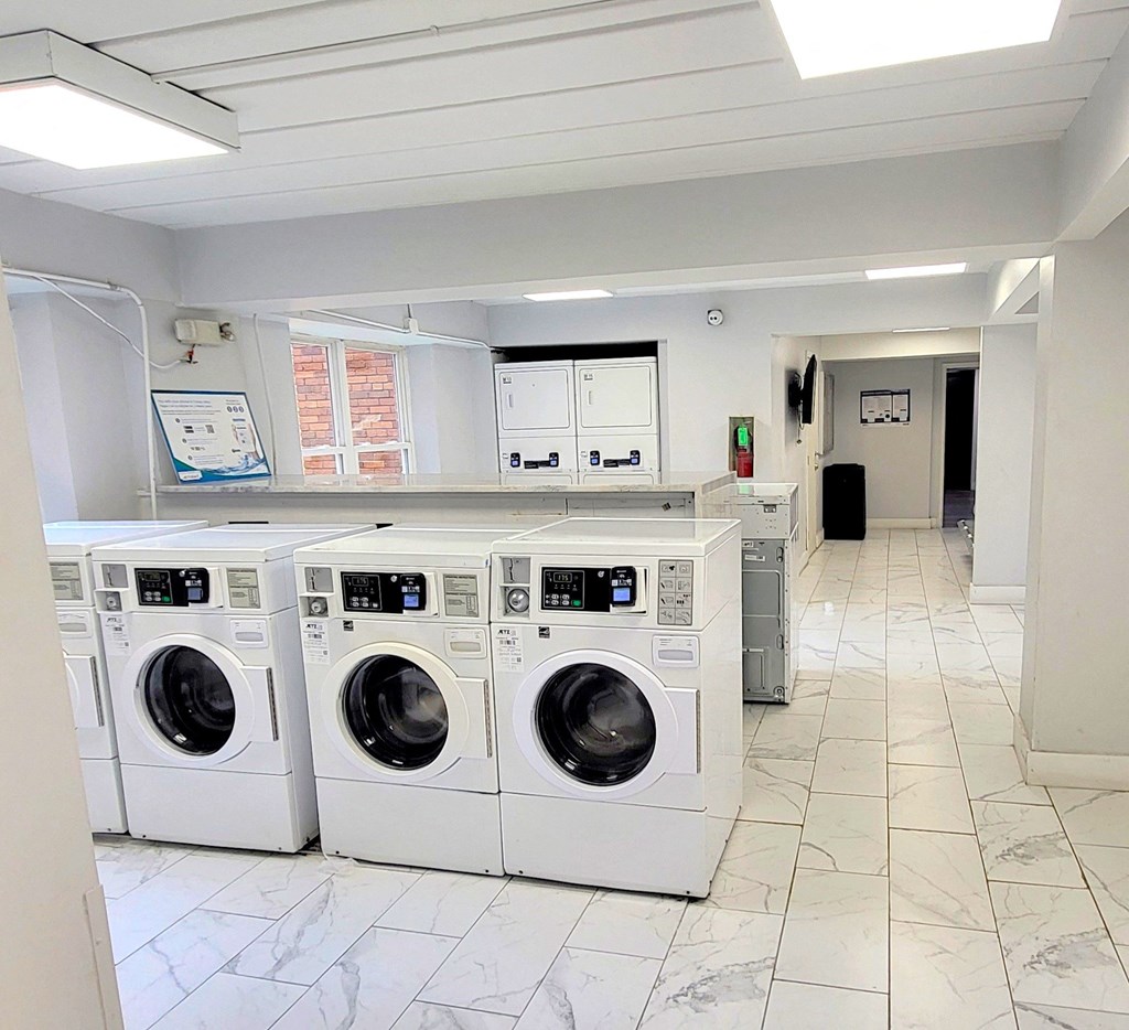 a washer and dryer area in a laundry room