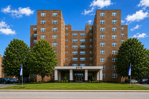 A large brick building with the number 3710 on the front.