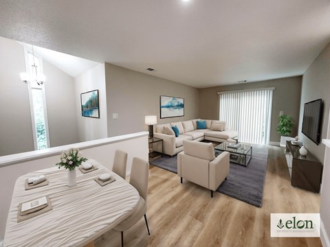 A living room with a dining table and chairs.