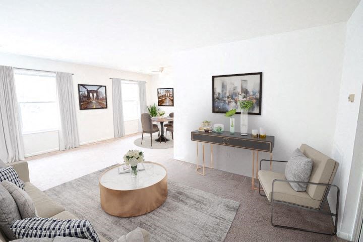 a living room with a couch and a table