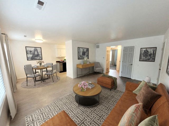 a living room with a couch and a table