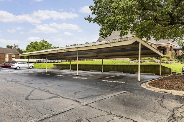a parking lot with a covered parking lot