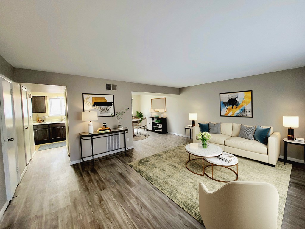 a living room with a couch and a table