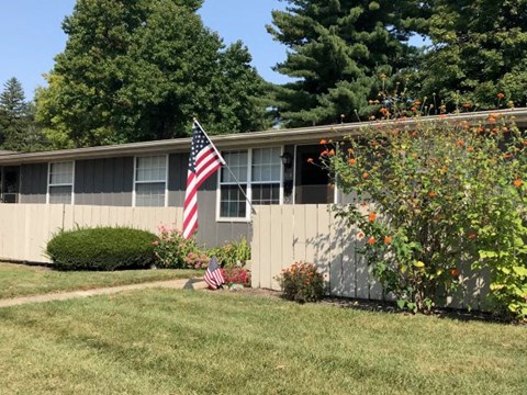 a house with an flag in front of it