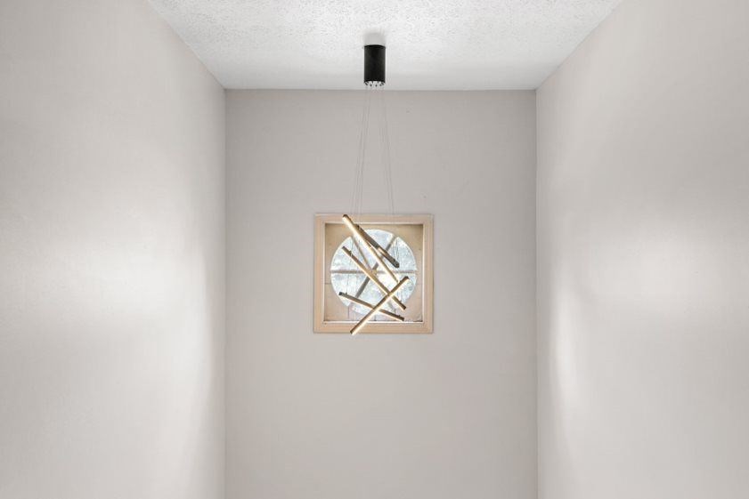 a clock hanging on a wall in a room