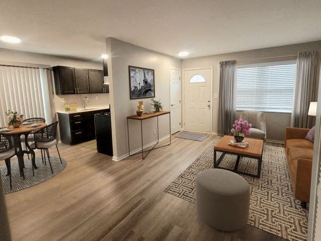 Living room area near the kitchen and dining area. 