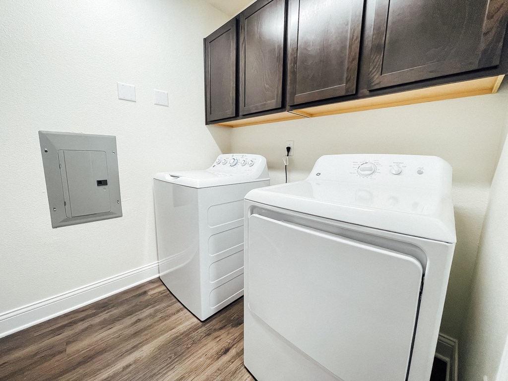 the private laundry room of our studio apartment atrium has a washer dryer