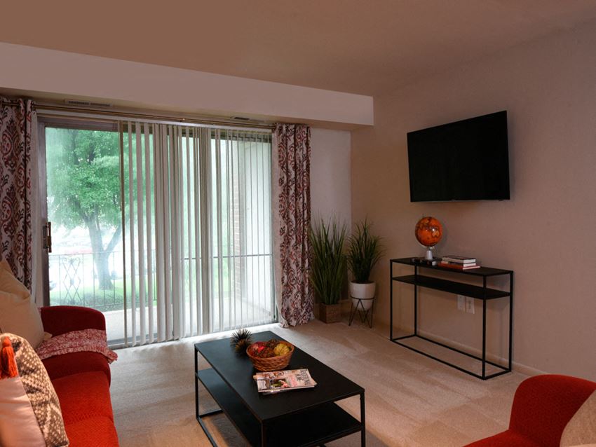 Spacious Living Room at Woodridge Apartments, Maryland - Photo Gallery 1