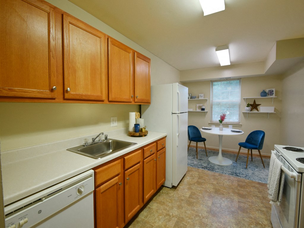 Kitchen with Ample Storage at Woodridge Apartments, Randallstown, MD