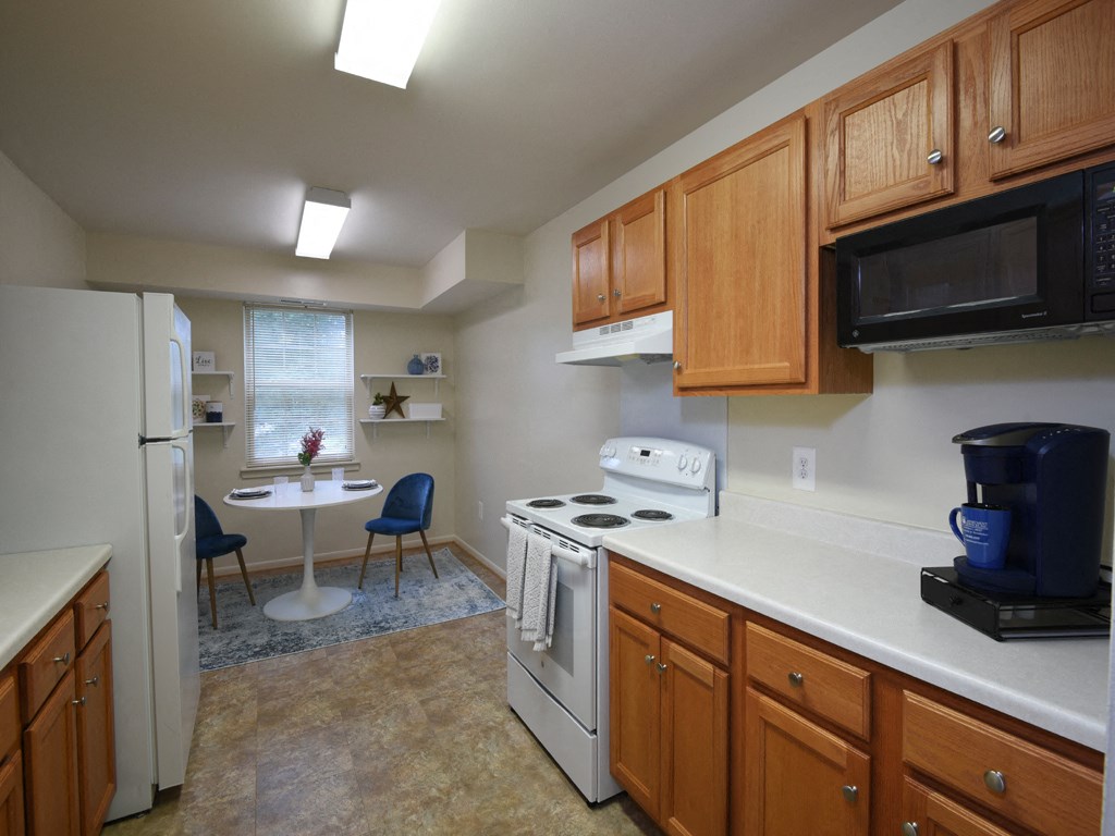 Refrigerator and Kitchen Appliances at Woodridge Apartments, Randallstown, 21133