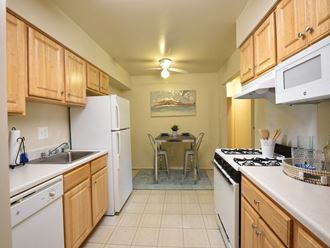 Lots of kitchen storage and eat in space at Deer Park Apartments
