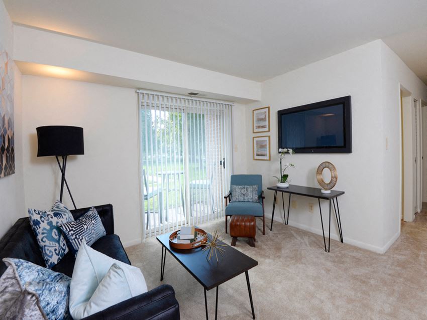 Spacious Living Room With Private Balcony at Woodsdale Apartments, Abingdon, MD - Photo Gallery 1