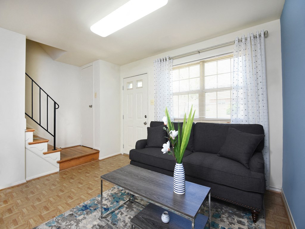 Large living room with lots of natural light  at Kingston Townhomes, Baltimore, 21220