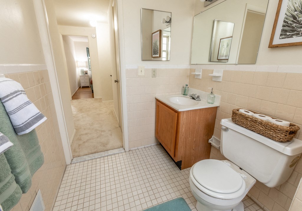 Hallway bathroom with soaking tub and natural light at The Orchards at Severn Townhomes*, Severn