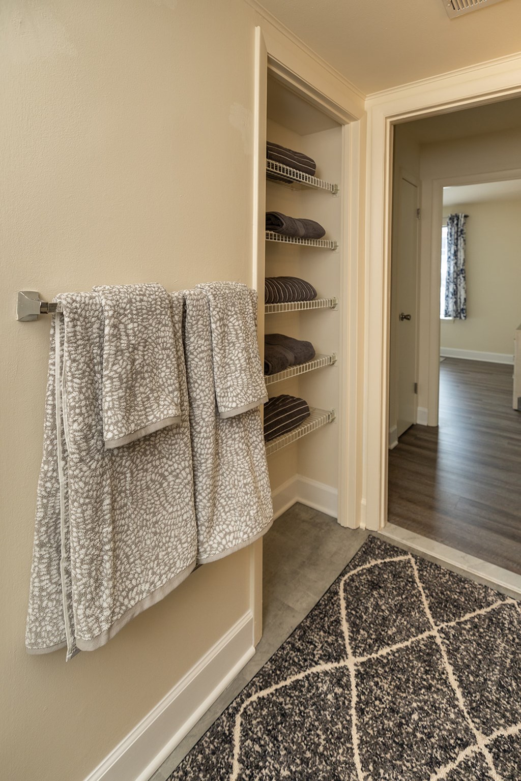A bathroom with a towel rack at The Brittany Apartments, Maryland